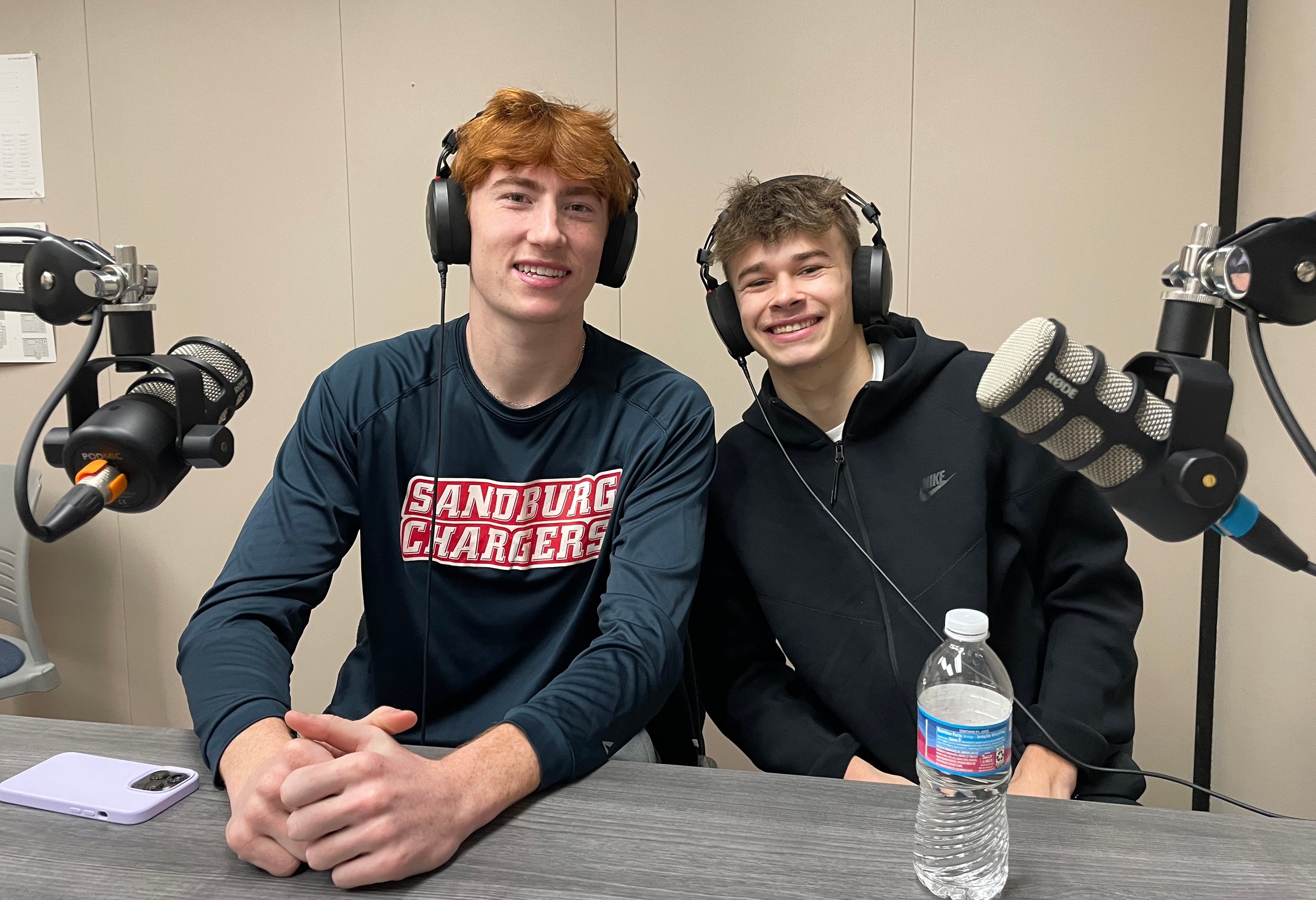 Ethan Price (left) and Logan Sluder (right) in recording studio for the Sandburg Athletics Podcast.