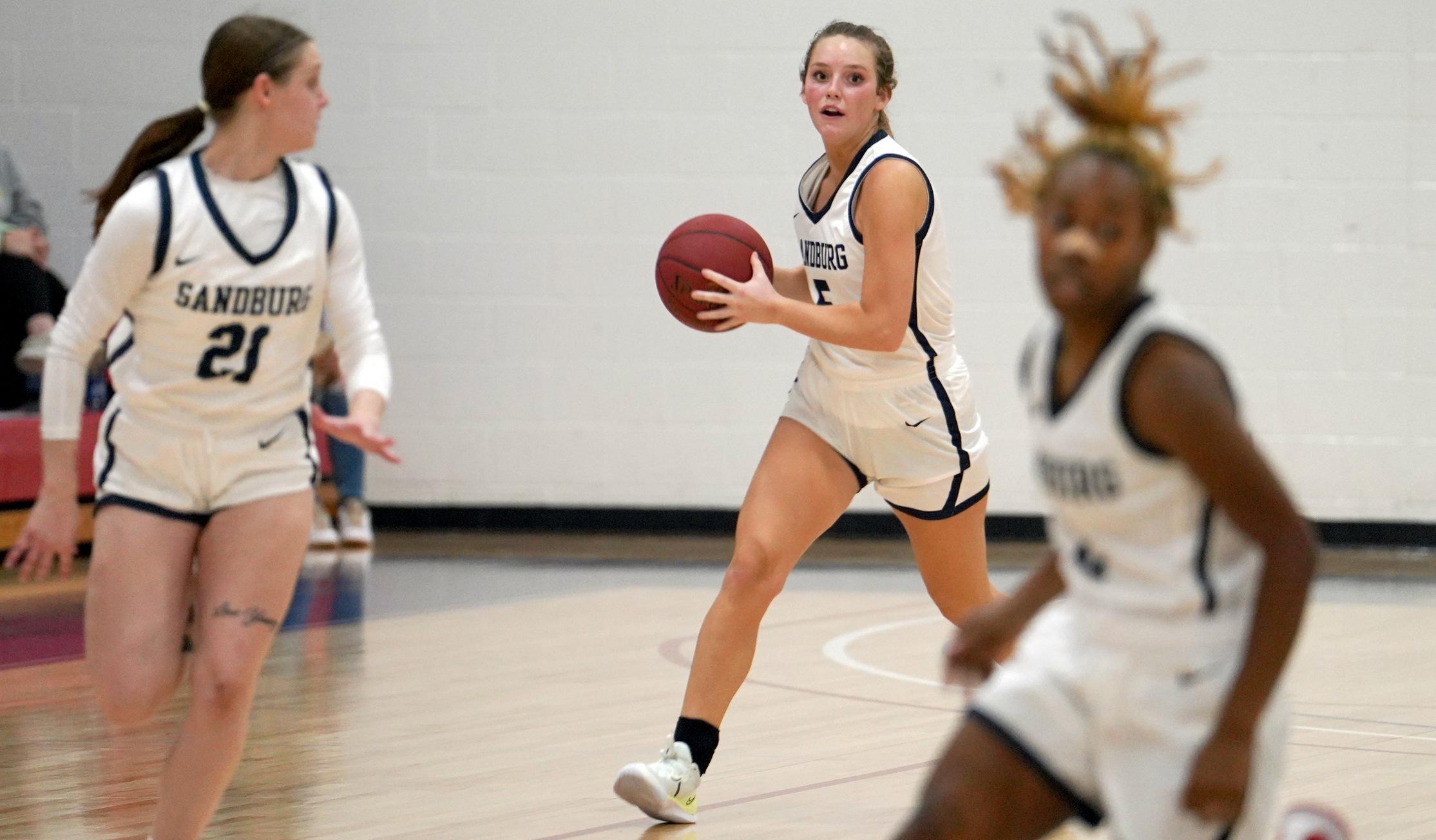 Chargers sophomore Addison Eger looks up the floor as the brings the ball up in a game against Southeastern at John Lewis Gym.